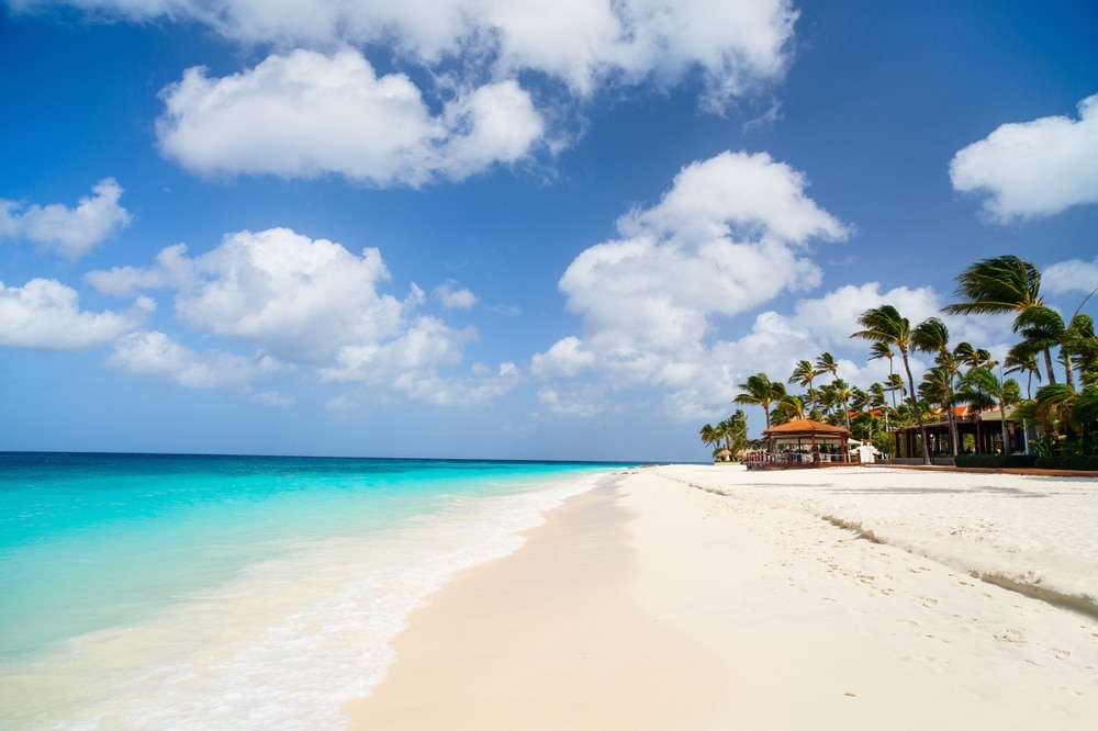 Idyllic,Tropical,Beach,With,White,Sand,And,Turquoise,Ocean,Water